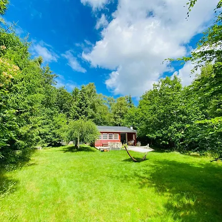 Red Wooden House In The Middle Of Frederiksvaerks Nature