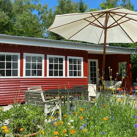 Red Wooden House In The Middle Of Frederiksvaerks Nature *